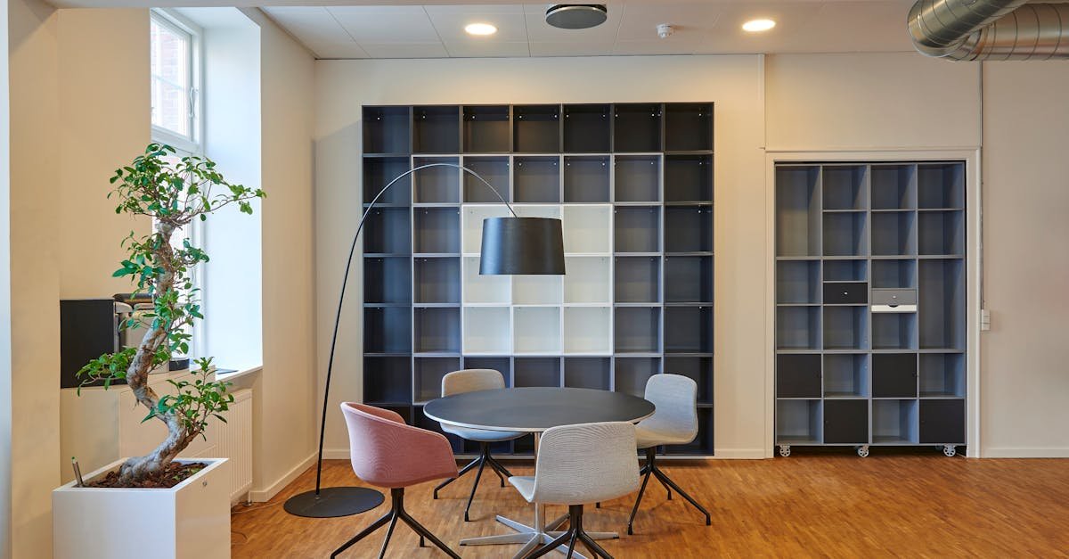 pexels-photo-245240-245240-1 Bright and stylish office space with contemporary furniture and open shelving.
